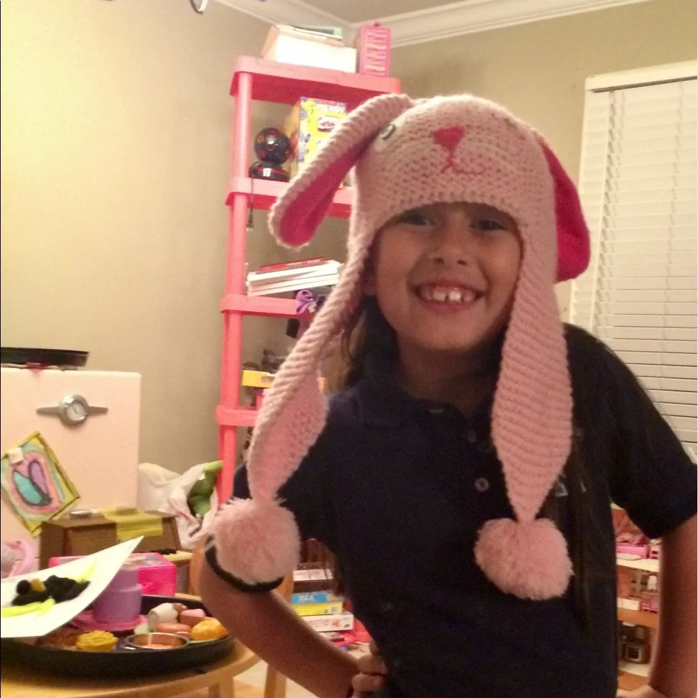 “SOME BUNNY LOVES YOU” HAT WITH POM POMS